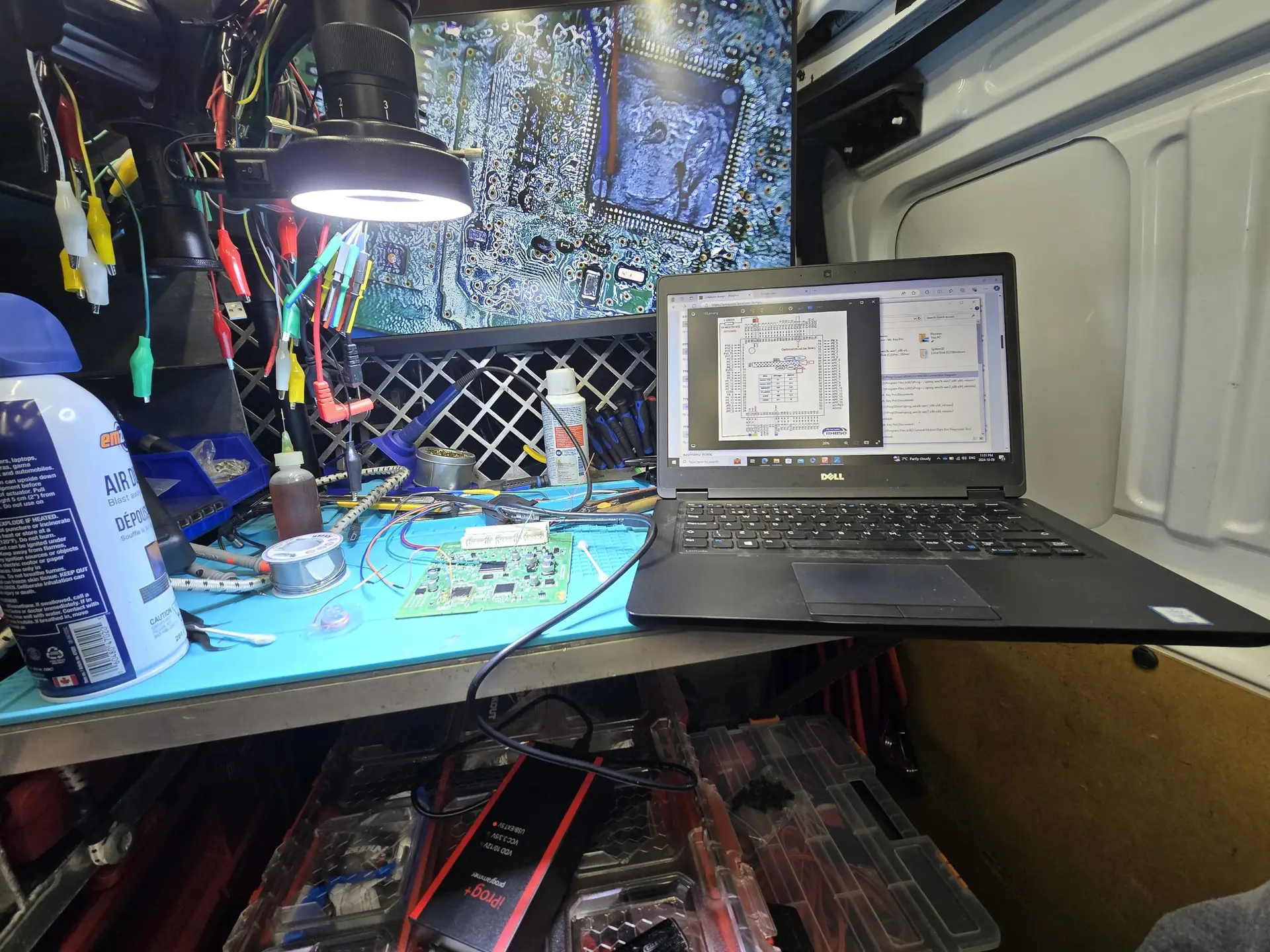 Automotive Locksmith Van workbench, with laptop and circuit board for Toyota Smart Key System