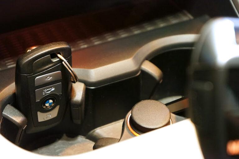 Bmw emergency key start location in cup holder